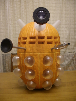 Illustration for article titled Dalek pumpkin wants to exterminate your candy